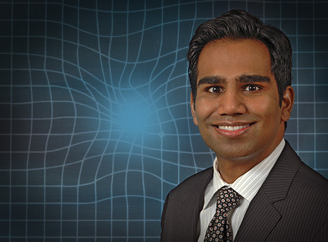 Rajesh C. Rao, MD, with a simulation of macular degeneration