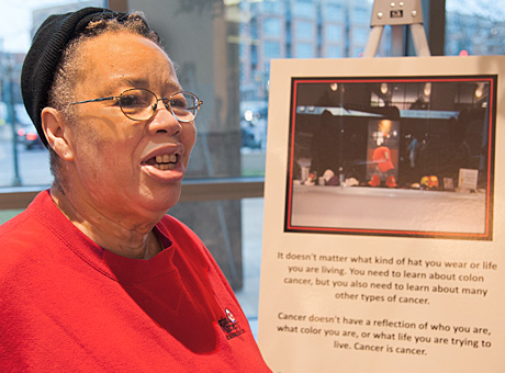 Vivian Elgin with the photo and poster she created as part of Photovoice